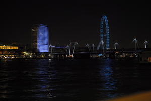 artificial lighting, city, city, city lights, cityscape, England, eye level view, ferris wheel, London, London eye, night, river, riverbank, spring, The United Kingdom, tower, urban