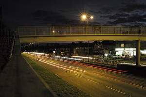 artificial lighting, bridge, car lights, city lights, elevated, England, evening, lamppost, London, night, outdoor lighting, road, The United Kingdom, urban, winter