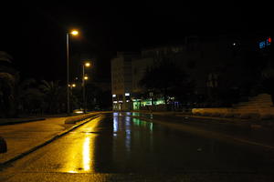 artificial lighting, city, Croatia, eye level view, night, spring, street, street light, urban, walkway, wet, Zadar, Zadarska