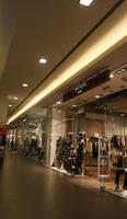 artificial lighting, ceiling, Dolnoslaskie, eye level view, indoor lighting, Poland, shopfronts, shopping centre, Wroclaw