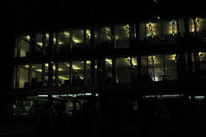 artificial lighting, building, city, city lights, England, eye level view, facade, London, night, office building, outdoor lighting, The United Kingdom, urban