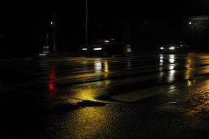 artificial lighting, city lights, eye level view, Kalisz, night, outdoor lighting, Poland, street, urban, wet, Wielkopolskie, winter
