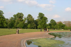 broad-leaf tree, broad-leaved tree, day, deciduous, England, eye level view, group, London, park, path, people, pond, spring, sunny, The United Kingdom, tree, treeline, walking