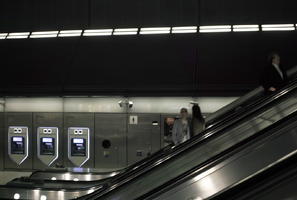 artificial lighting, England, escalator, eye level view, London, night, station, The United Kingdom