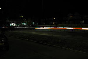artificial lighting, car lights, city lights, England, evening, eye level view, London, night, outdoor lighting, road, The United Kingdom, urban, winter