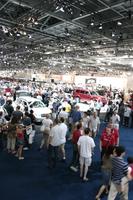 artificial lighting, ceiling, crowd, elevated, England, exhibition, interior, London, people, The United Kingdom
